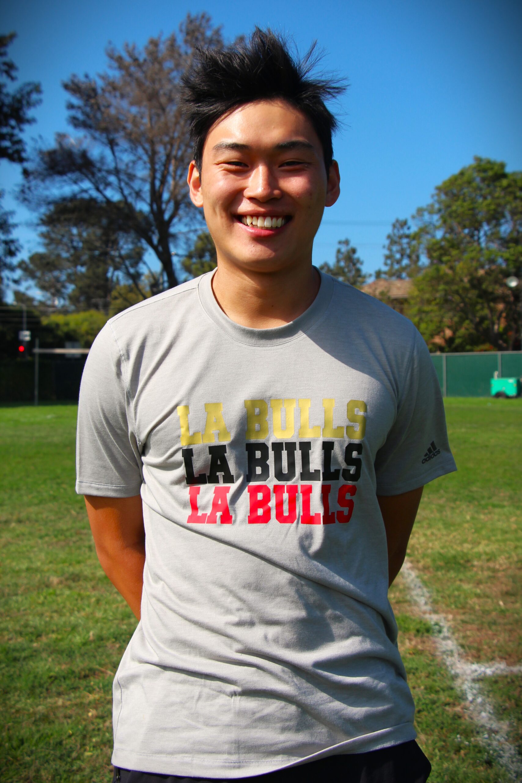 Picture of young male in grey bulls shirt 