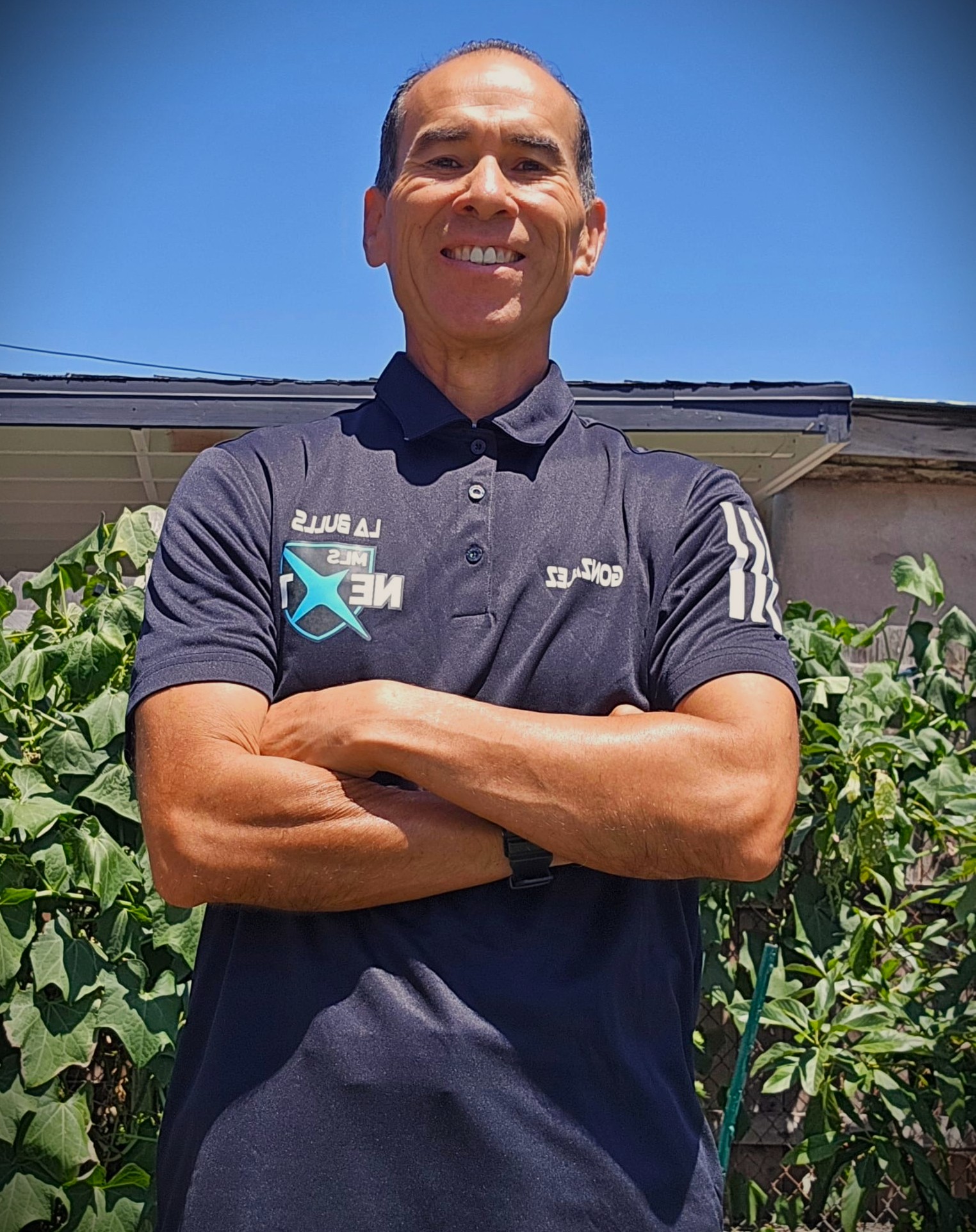 Felipe Gonzalez Headshot Image of male in MLS Next Logo Shirt
