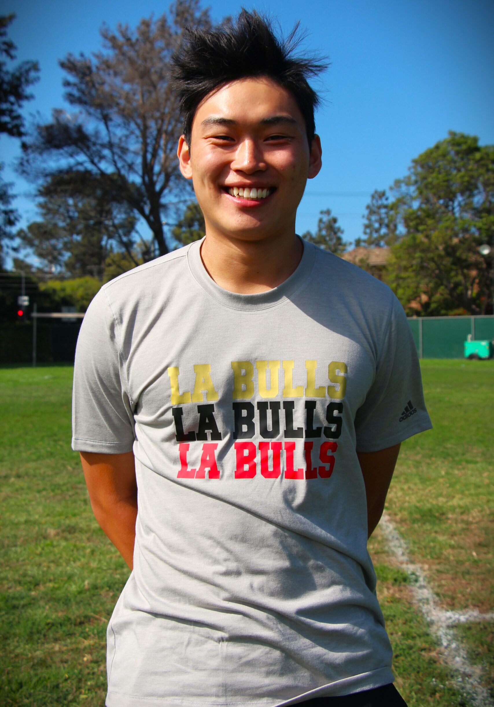 Picture of young male in grey bulls shirt 